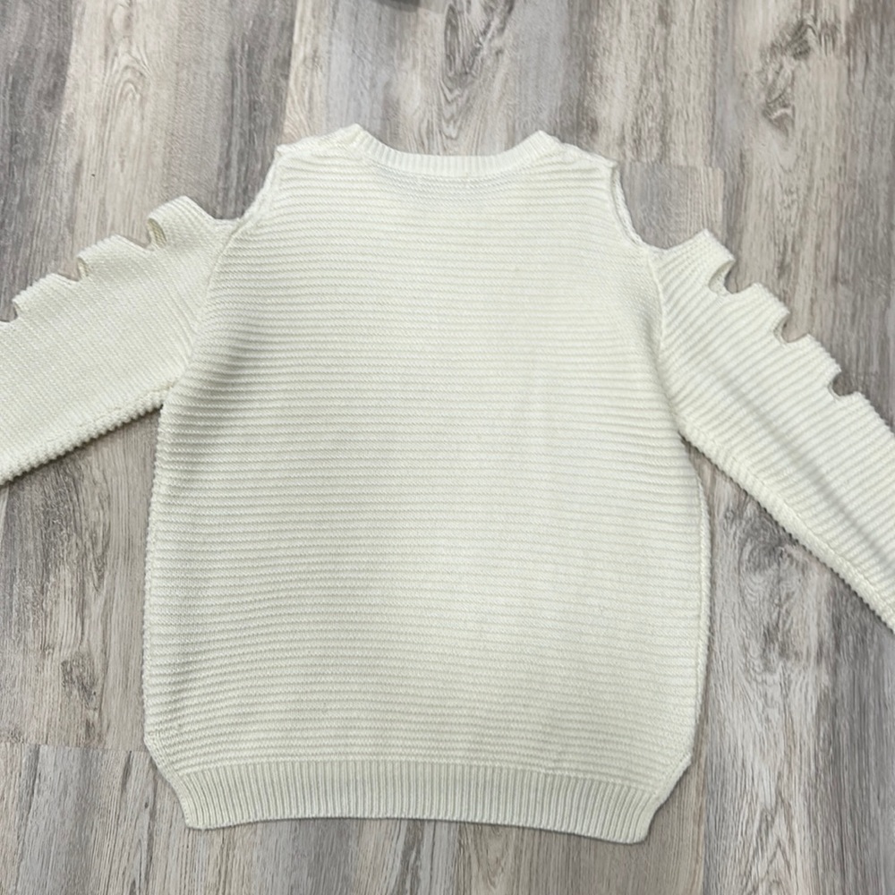 A cute white sweater